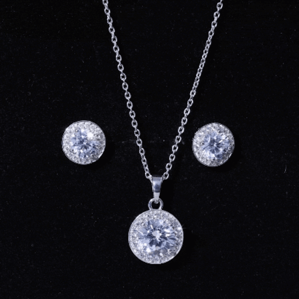 Rosec Jewels 4 Carat cubic zirconia halo necklace and earrings set featuring round stones in silver finish.