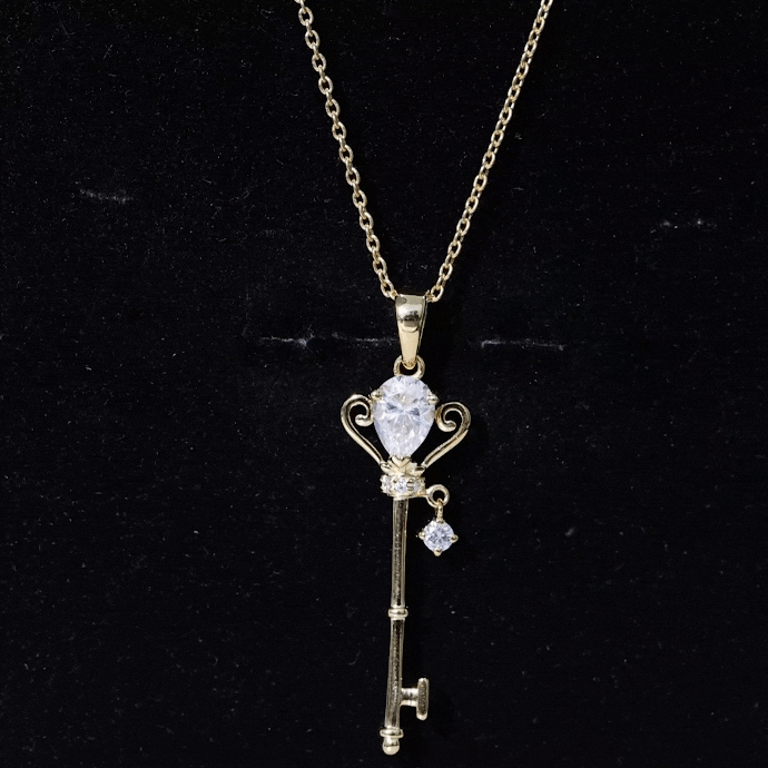 Yellow 5x7 mm pear-shaped diamond pendant from Rosec Jewels, showcasing a sparkling lab-certified diamond and elegant pendant design.