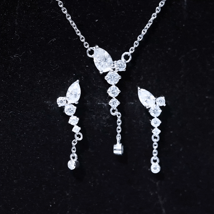 Certified lab-grown diamond jewelry set with designer necklace and earrings by Rosec Jewels, featuring yellow accents and intricate design.