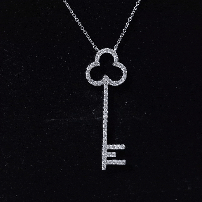 Yellow lab-grown diamond key pendant necklace for women by Rosec Jewels, featuring a sparkling gemstone on a delicate chain.