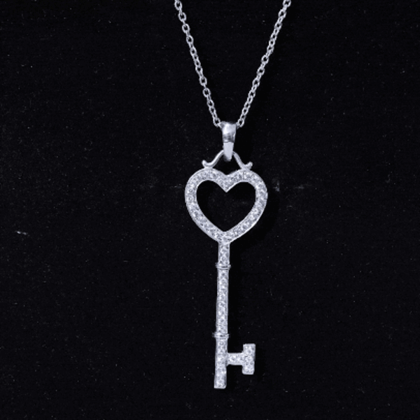 Yellow lab-grown diamond "Key to My Heart" pendant necklace from Rosec Jewels featuring a sparkling key-shaped pendant.