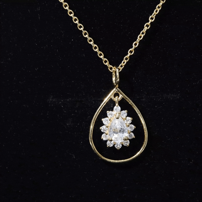 Yellow pear-shaped lab-grown diamond teardrop pendant necklace from Rosec Jewels, showcasing a sparkling gemstone on a delicate chain.