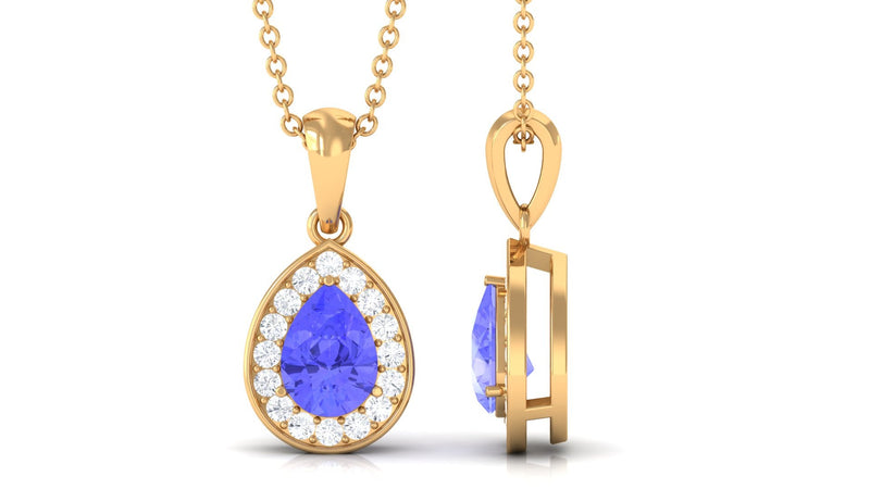Tanzanite teardrop halo pendant necklace featuring a vibrant blue gemstone surrounded by a silver halo setting.