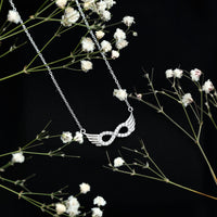 Sterling Silver Pave Set Moissanite Infinity Necklace with Wings