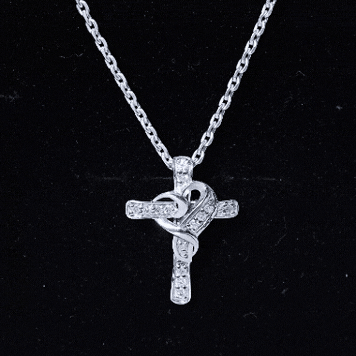 Certified Moissanite cross and heart pendant on silver chain by Rosec Jewels, showcasing a sparkling jewelry piece.