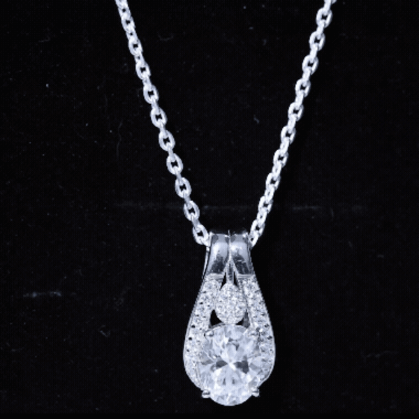 Certified 2 Carat Oval Moissanite teardrop pendant for wedding, featuring sparkling white moissanite stone and elegant pendant setting.