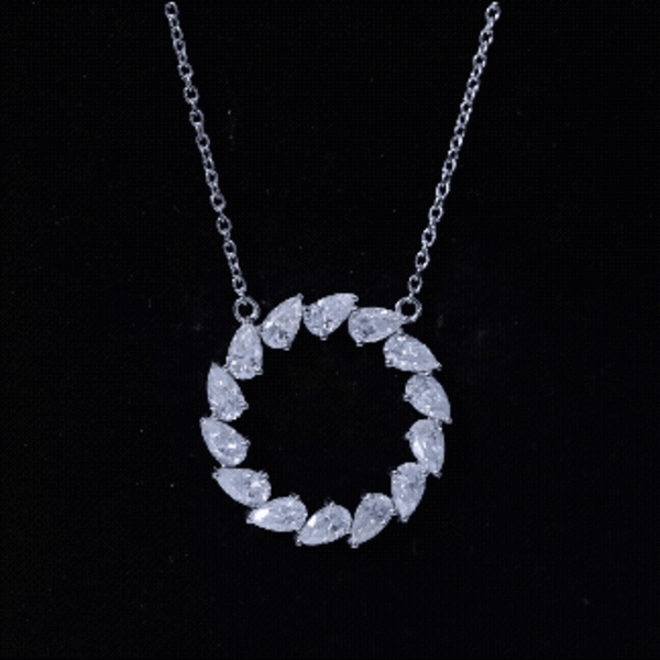Pear-shaped 2 carat Moissanite pendant on silver chain, elegant jewelry piece from Rosec Jewels.