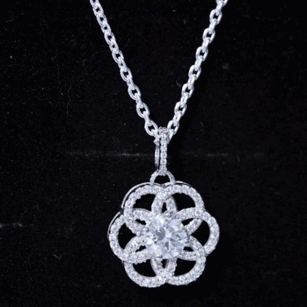 Silver chain necklace with a flower-shaped moissanite pendant, featuring sparkling white gemstones from Rosec Jewels.