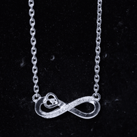 Minimalist Moissanite Infinity Heart Necklace in 14K Gold Plated Silver
