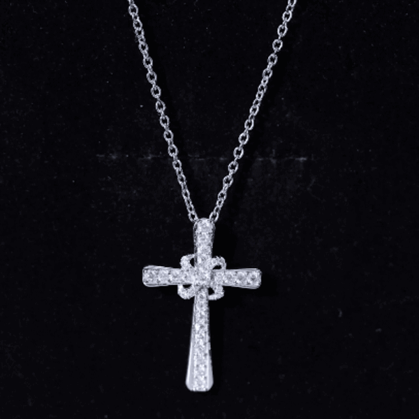 Silver chain pendant with a certified moissanite cross from Rosec Jewels, featuring a sparkling white moissanite gemstone.