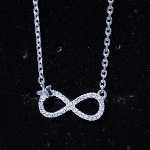 Certified pave set moissanite infinity pendant with butterfly design, featuring sparkling stones and delicate craftsmanship.