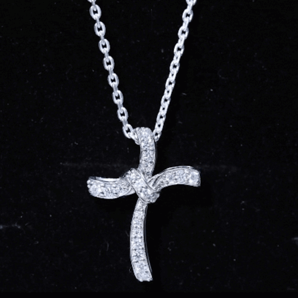 Sterling silver moissanite cross pendant with unique design, featuring sparkling stones, from Rosec Jewels.