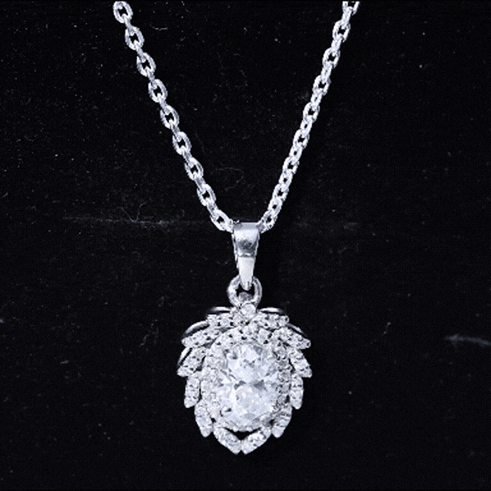 Oval-shaped 1.29 carat Moissanite wedding pendant with silver chain from Rosec Jewels, featuring a sparkling gemstone centerpiece.