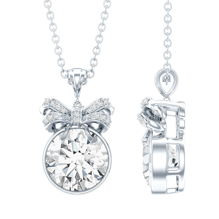 Bezel set 2 carat moissanite pendant with bow design by Rosec Jewels, featuring a sparkling central stone and elegant pendant style.