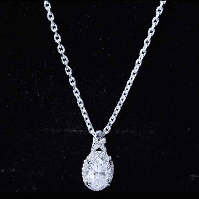 Oval-shaped 1 carat certified moissanite pendant with a halo setting, featuring a Rosec Jewels pendant design.