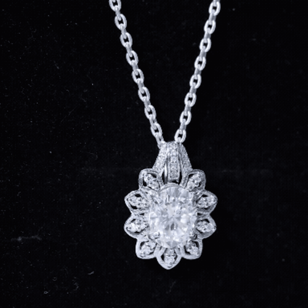 Oval moissanite vintage pendant necklace with silver chain, featuring a 2-carat certified gemstone and elegant design by Rosec Jewels.
