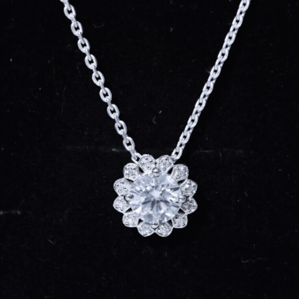 Rosec Jewels 2 CT moissanite flower pendant necklace on silver chain, showcasing sparkling floral jewelry design.