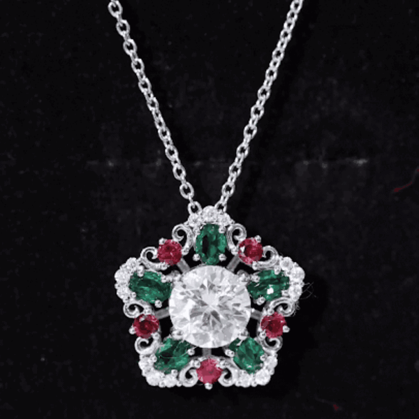 Elegant rose gold pendant featuring a 2-carat moissanite center with lab ruby and emerald accents by Rosec Jewels.