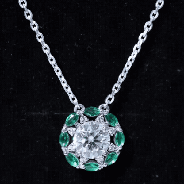 2 Carat Moissanite Halo Pendant with Lab Grown Emerald by Rosec Jewels featuring a sparkling central stone and intricate halo design.