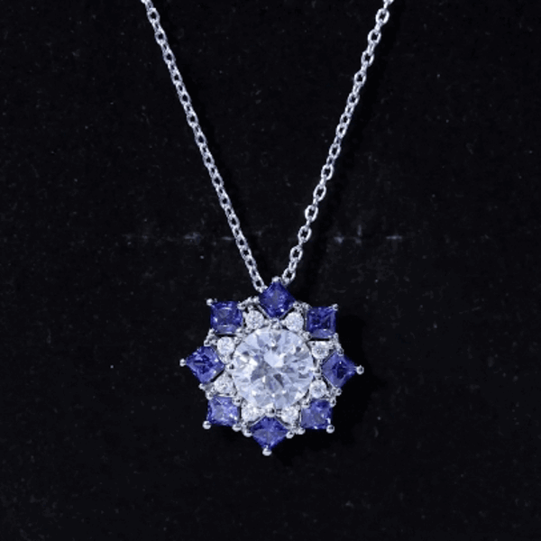 Elegant Rosec Jewels pendant featuring a 2-carat moissanite and sapphire on a silver chain.