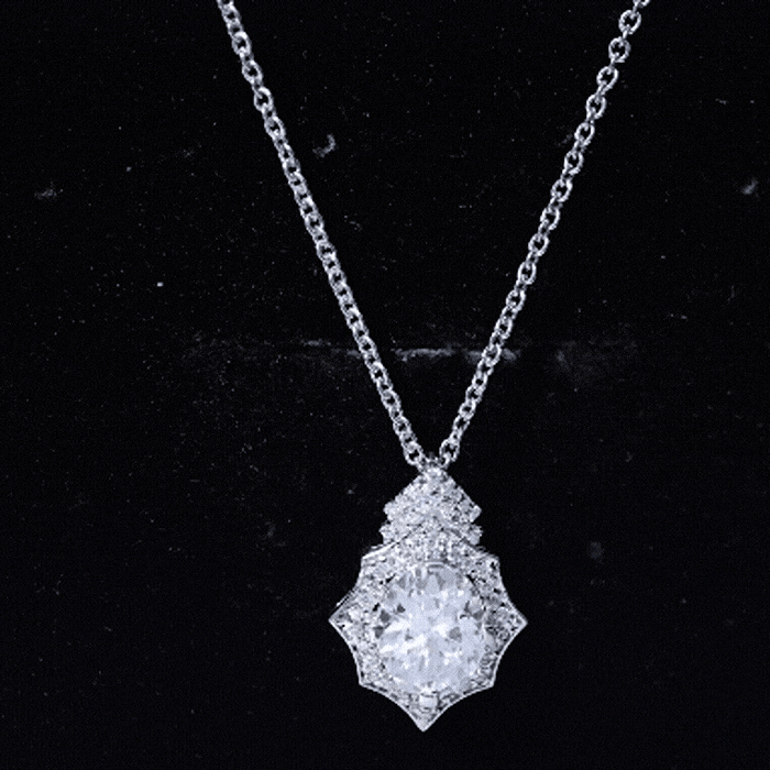 Vintage halo pendant necklace with 2-carat moissanite, featuring a classic design and sparkling white gemstone, by Rosec Jewels.