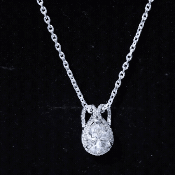 Certified 1.4 carat Moissanite teardrop pendant on silver chain, elegant jewelry from Rosec Jewels, perfect for weddings or special occasions.