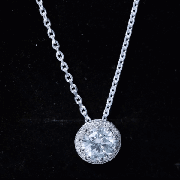 Certified 2 Carat round moissanite pendant necklace with silver chain by Rosec Jewels, featuring a sparkling gemstone and elegant design.