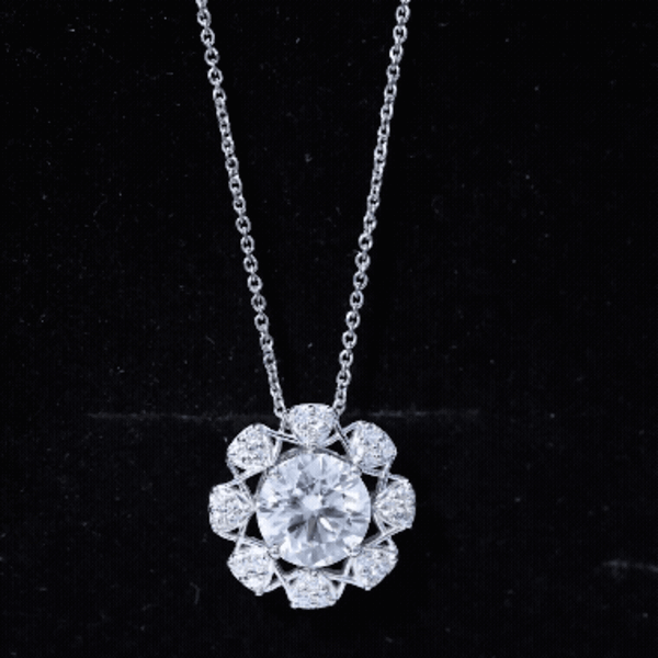 Brilliant cut 2 carat Moissanite bridal pendant on a silver chain, featuring a sparkling white gemstone from Rosec Jewels.