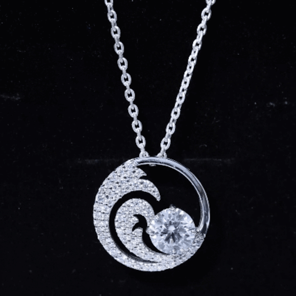 Certified Moissanite Ocean Wave pendant on a silver chain by Rosec Jewels, showcasing a sparkling ocean-inspired design.