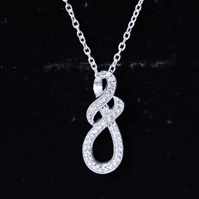 Certified Moissanite infinity pendant necklace with silver chain, featuring a sparkling moissanite stone and elegant design.