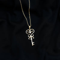 Vintage-inspired cubic zirconia key pendant necklace by Rosec Jewels, featuring a sparkling key design with certificate of authenticity.