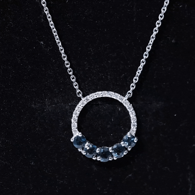 Elegant London Blue Topaz and diamond pendant from Rosec Jewels, showcasing a sparkling eternity necklace design.