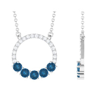 Natural London Blue Topaz and diamond pendant necklace showcasing a sparkling blue topaz surrounded by diamonds, from Rosec Jewels.