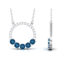 Natural London Blue Topaz and diamond eternity pendant necklace by Rosec Jewels featuring a sparkling blue topaz and diamond accents.