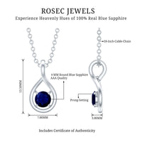 Round cut blue sapphire teardrop pendant from Rosec Jewels showcasing a sparkling blue gemstone on a silver chain.