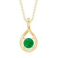 Genuine 5mm round cut emerald pendant with teardrop shape and chain from Rosec Jewels, showcasing the elegant jewelry design.