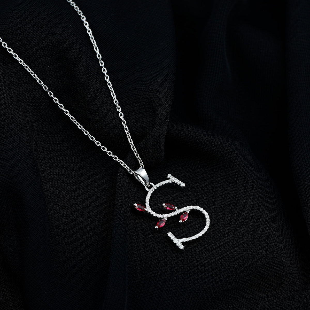 Lab grown ruby and diamond pendant necklace with letter S by Rosec Jewels, featuring sparkling gemstones and elegant design.