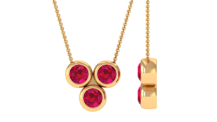 Bezel set ruby three-stone promise necklace for women by Rosec Jewels featuring a pendant with three vibrant rubies.