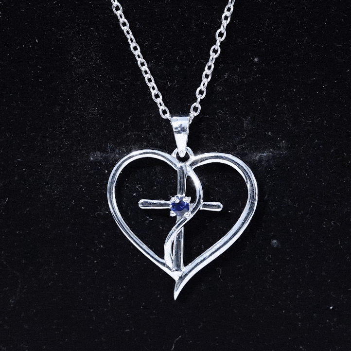 14k gold plated silver pendant featuring a natural blue sapphire heart-shaped cross design, from Rosec Jewels.