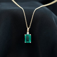 1.6 Carat Emerald Cut Lab Created Emerald Solitaire Necklace with Diamond