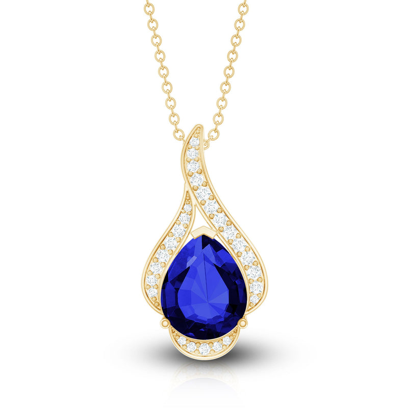 Lab-grown blue sapphire pendant necklace with diamond, showcasing elegant Rosec Jewels pendant on a chain.