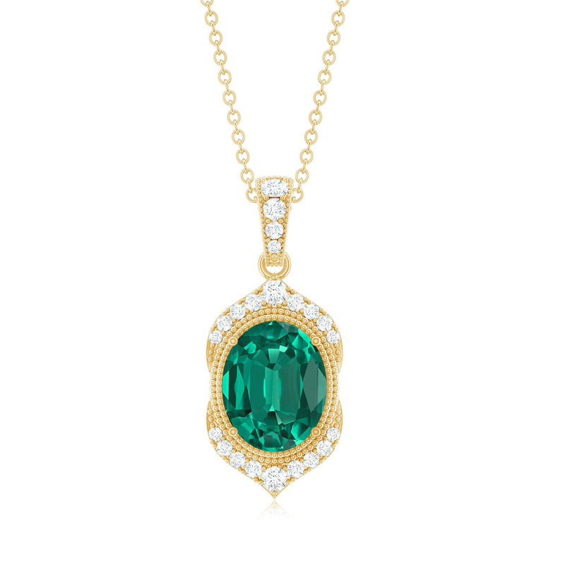 Lab grown emerald vintage-inspired pendant necklace with diamonds by Rosec Jewels, featuring a detailed design and sparkling gemstones.