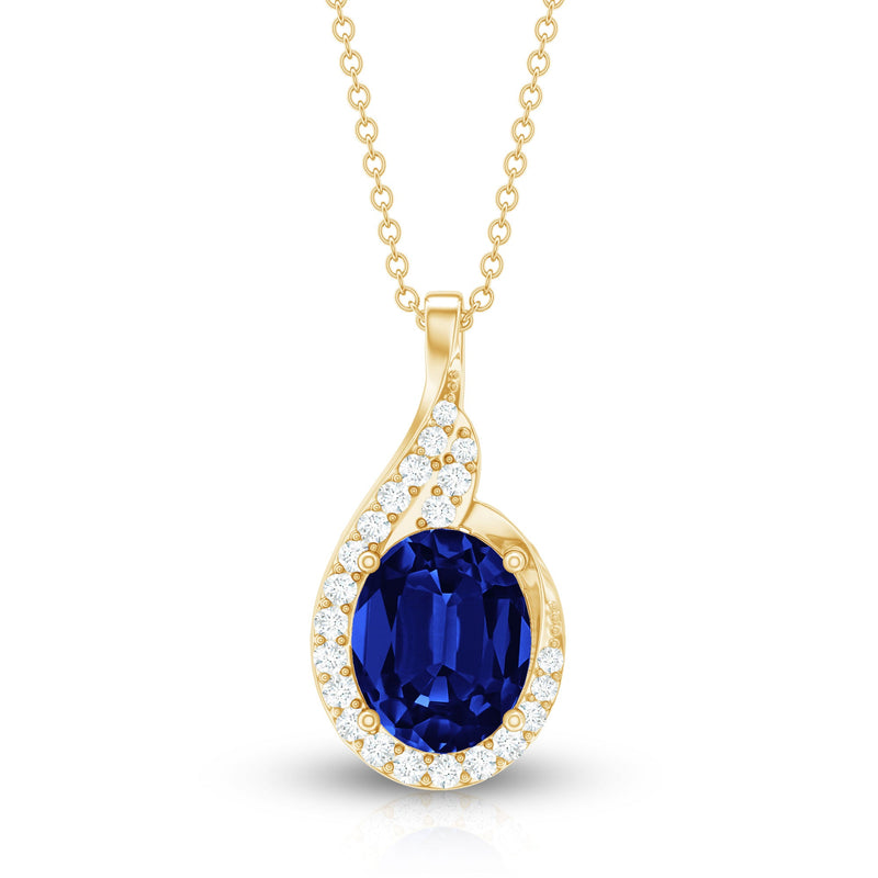 Oval pendant necklace featuring lab-grown blue sapphire and diamonds, crafted by Rosec Jewels.