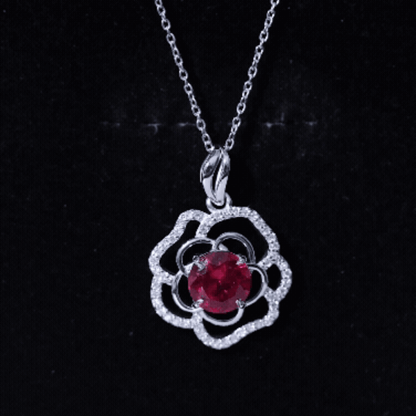 Yellow lab grown ruby rose pendant necklace with diamond accents by Rosec Jewels, showcasing a delicate floral design and sparkling stones.