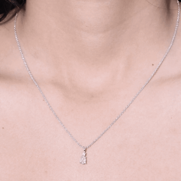 Pear-shaped lab-grown diamond pendant with teardrop design on a silver chain, featuring a 6x5mm diamond from Rosec Jewels.