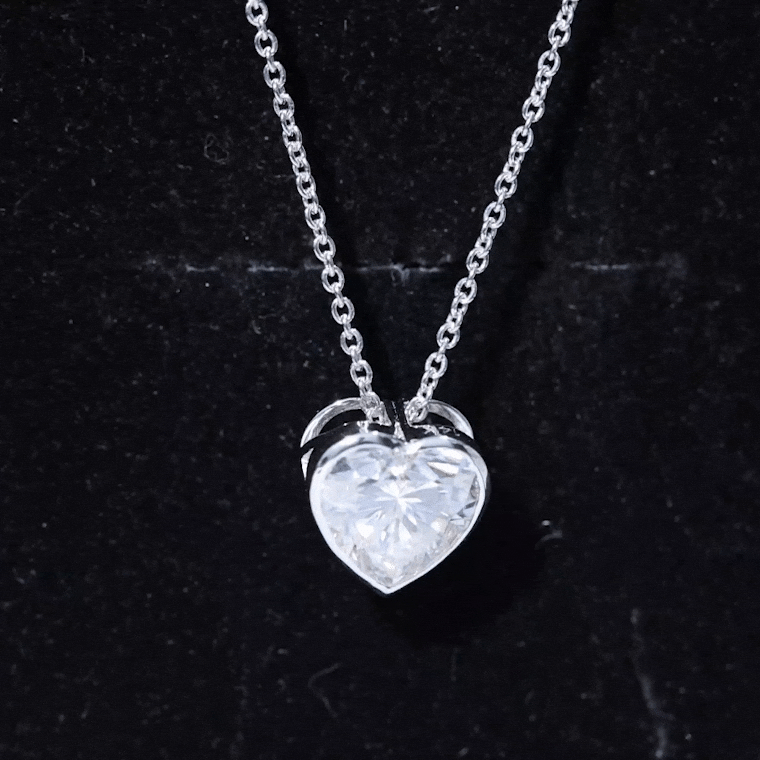 Bezel set 2 carat cubic zirconia heart pendant necklace with chain by Rosec Jewels, showcasing a sparkling heart-shaped pendant.