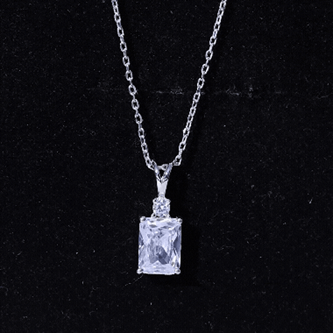 Certified 1.87 carat emerald cut cubic zirconia pendant necklace with silver chain by Rosec Jewels, showcasing a sparkling gemstone centerpiece.