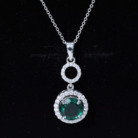 Lab Grown Emerald and Moissanite Halo Pendant Necklace