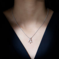 Natural diamond star pendant for women from Rosec Jewels, showcasing a sparkling star-shaped pendant with intricate details.