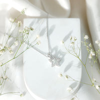 Natural diamond star pendant for women from Rosec Jewels, featuring a sparkling star-shaped pendant with intricate design.